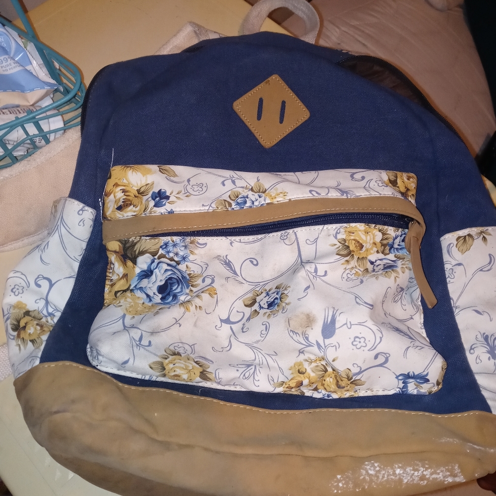 A checkered Dickies backpack and a floral one